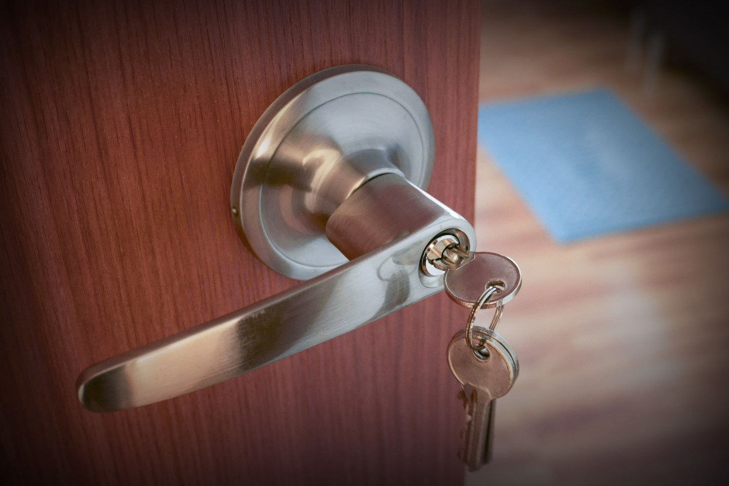 keys in a door handle lock on a door